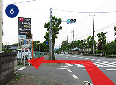 After seeing the sign for Tamajiman and Tama no Megumi, turn left.